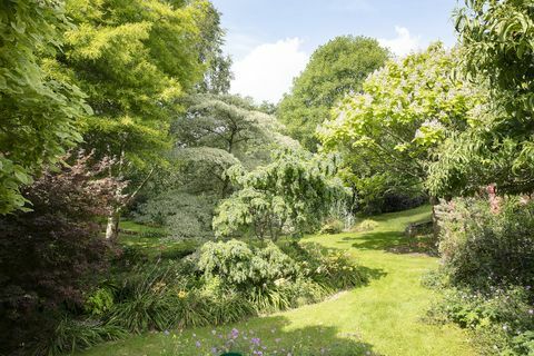 casa somerset com jardins gloriosos à venda