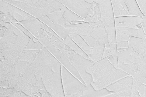 fundo abstrato branco de massa de enchimento e gesso com traços e traços irregulares