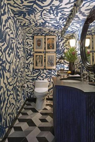 lavabo, azulejos pretos cinza, papel de parede branco e azul