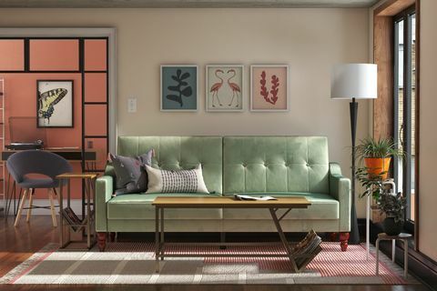 sofá de veludo azul-petróleo claro na sala de estar